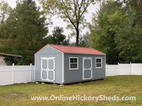 Hickory Sheds Utility Shed with Rustic Red Metal Roof